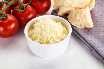 Shredded Italian hard parmesan cheese