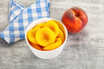 Ripe sweet and juicy canned peach