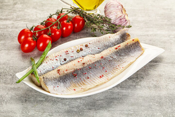 Marinated herring fillet with green onion