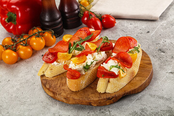 Bruschetta tapas with chorizo and tomato