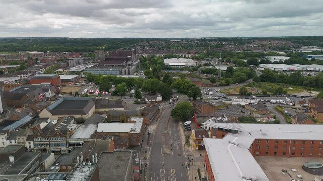 Drone revealing coventry skyline with cathedral ruins in background