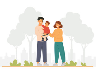 Happy family with their son walking outdoors at the park. International family day