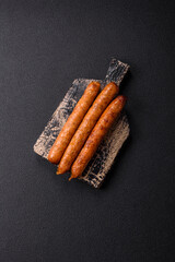 Juicy fried beef or pork sausages with salt, spices and herbs