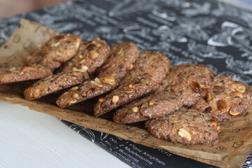 Baked cookies on a plate. Healthy cookies with peanuts and chocolate.