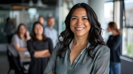 Fototapeta premium Happy smiling confident female Hispanic businesswoman team leader standing together with diverse multiethnic business group in office. Company professional multinational staff portrait