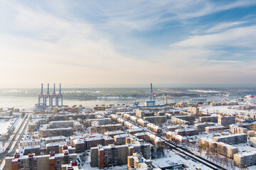 Aerial view of Klaipeda city port area and it's surroundings on sunny winter evening. The Old town of Klaipeda, Lithuania in evening light at wintertime.
