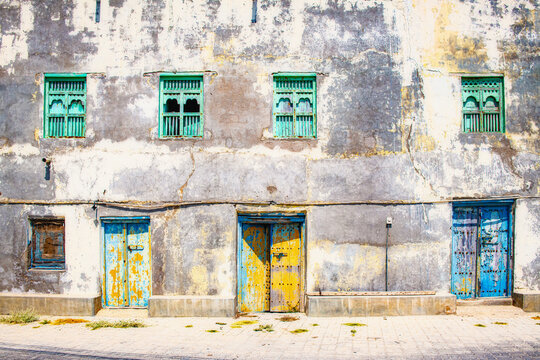 Old windows and doors in Mirbat, Oman.