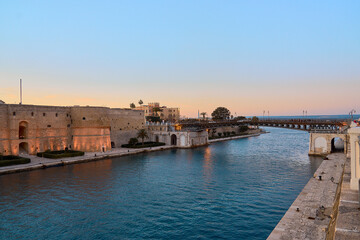 Aragonese castle of Taranto at sunset with orange colors in high definition