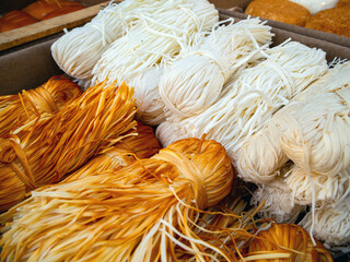 Sale of farmer's cheese braids of different types