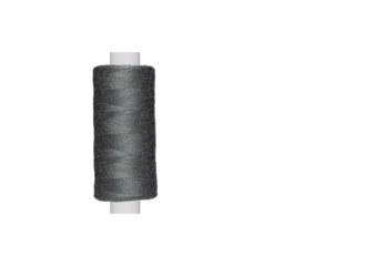 grey spool of sewing thread isolated on white background close up