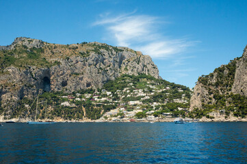 Fototapeta premium Scenic View of Capri Island's Rocky Coastline in Italy villa olga capri Spiaggia di Marina Piccola