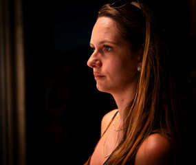 woman dramatic light dark black background