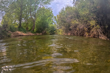Mijares river in Sarrion Teruel Aragon Spain summer time natural environment