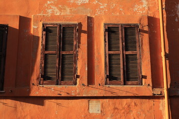 Borgo Pio Building Facade Windows with Aged Shutters in Rome, Italy