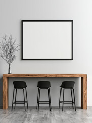 Three black bar stools sit at a wooden counter in front of a blank picture frame.