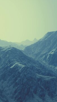 View of the Afghan mountains in fog