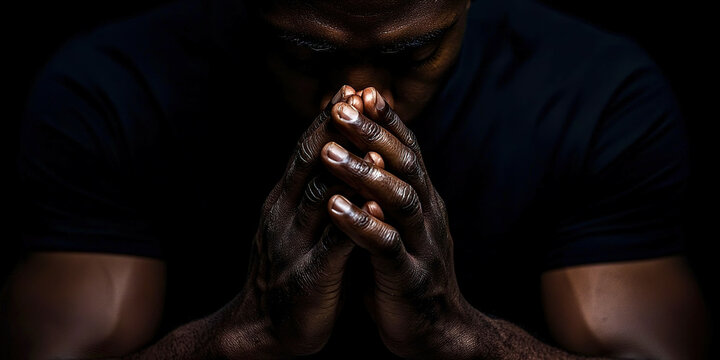 Folded hands in prayer