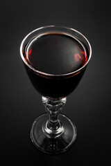 Cherry tincture in a glass, alcohol.
