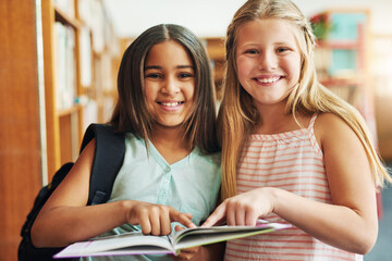 School kids, girl and portrait in library with book for education story, fantasy fiction or literature. Friends, student and novel at academy for language development, study and curious for learning