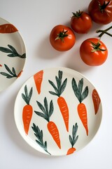 plates with hand-drawn carrots and tomatoes