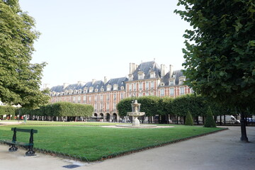 Gorgeous scene at Place des Vosges on a sunny morning