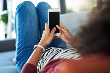 Woman, home and texting with smartphone screen on website for online dating. Female person, couch and mockup space in living room on social media for networking, communication and interaction