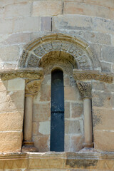 Fototapeta premium Detail of the apse window of San Pedro de Villanueva. Cangas de Onis, Asturias, Spain.