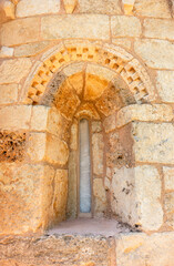 Detail of the apse window of San Pelayo de Perazancas. Palencia, Castile and Leon, Spain.