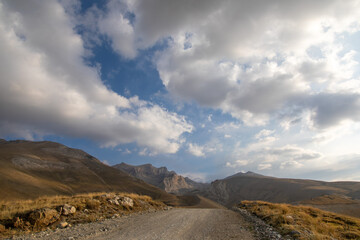 road in the mountains, an easy route for climbers to the top