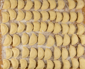 Varenyky on a wooden rack. Traditional Ukrainian food.