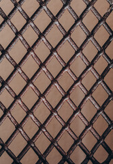 Naklejka premium old cast iron grating in diamonds