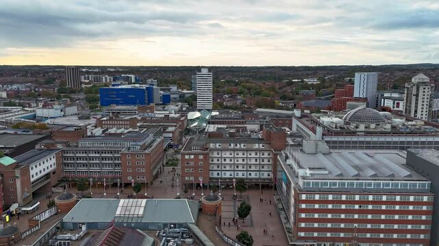 Camera panning over coventry city center showing holy trinity church