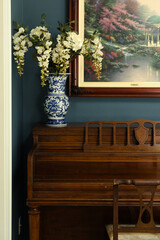 piano, flowers, and art
