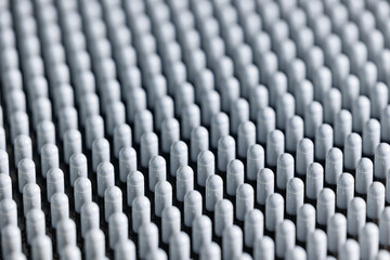 Fototapeta premium Manufacturing process, white capsules moving on conveyor in modern pharmaceutical factory. Medical production line