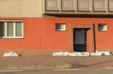 Sand bags in front of the  door in the house on riverbank of  Svratka, Brno, Czech republic, floods after storm Boris, September 15, 2024.