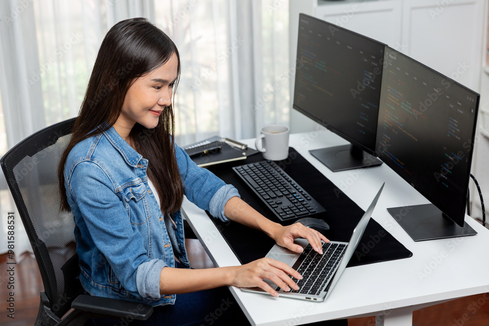 Poster smiling young asian in it developer creating with typing online information on laptop with coding pr