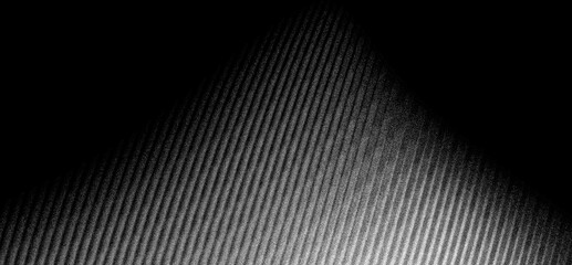 Black white grainy background, dark monochrome noise texture grunge abstract banner, poster header backdrop design © AdGraphics