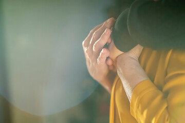 Man support his old grandmother, holds her hands.