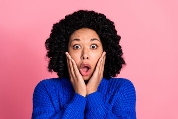 Portrait of worried nervous woman wear blue knitted stylish clothes isolated on pink color background