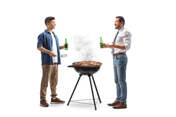 Men drinking beer and making bbq