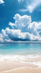 Fototapeta premium Breathtaking Seascape with Fluffy Clouds and Turquoise Ocean Waves Lapping the Sandy Beach