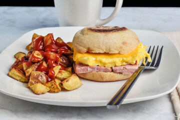 spam and scramble egg on a english muffin