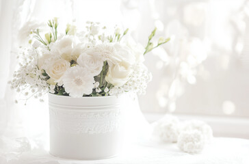 Stylish Bin Filled with White Bridal Accessories: Elegant Preparations for the Big Day