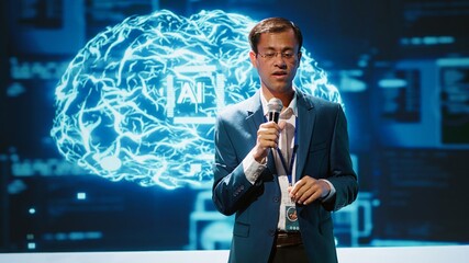 Speaker does presentation during tech conference, exploring successful implementation of AI in...