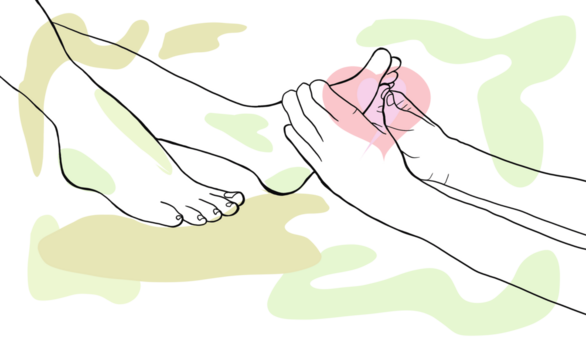 person receiving a reflexology foot massage treatment with the hands of a professional