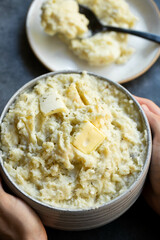 mashed ptoatoes in a bowl with butter