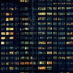 Seamless pattern of skycraper or office building windows at night - tiles, texture