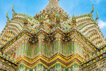 Intricate close-up facade of Wat Pho Temple ornate architecture with floral patterns and geometric designs in Bangkok city, Thailand, Asia. Temple of the Reclining Buddha. Popular tourist landmark