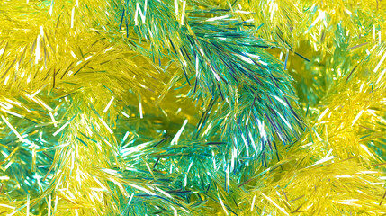 shimmering tinsel garland texture with a blend of metallic lemon yellow, lime green and sky blue strands