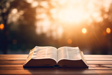 Bible lying open on a wooden surface, ready for reading.